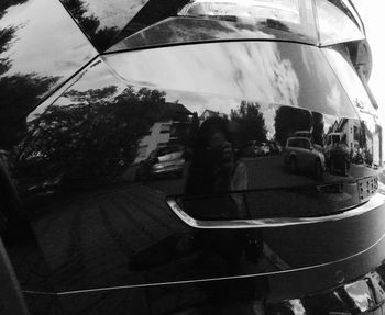 Reflection of man on glass