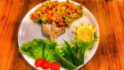 Close-up of served food in plate