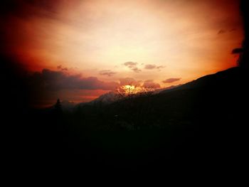 Silhouette of mountain at sunset