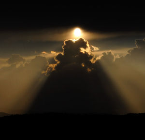 Scenic view of landscape against cloudy sky