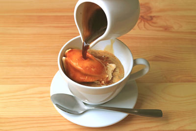 Close-up of coffee cup on table