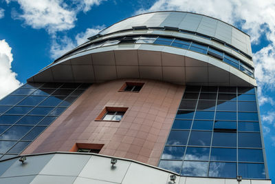 Low angle view of modern building against sky