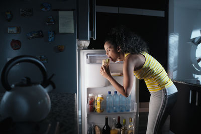 Woman looking at camera at home