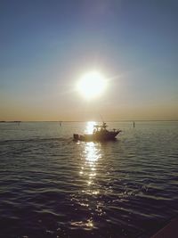 Scenic view of sea against sky at sunset