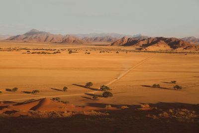 Scenic view of desert against sky