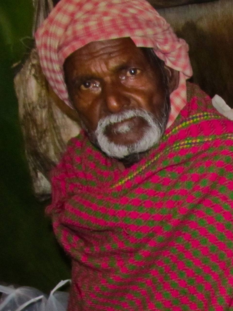 CLOSE-UP PORTRAIT OF MAN WITH HAT