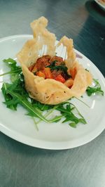 Close-up of served food in plate