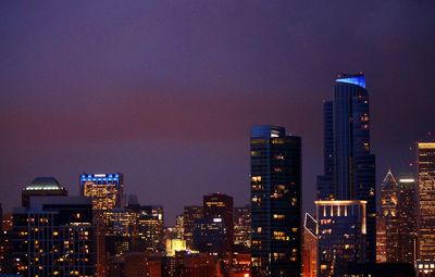 Skyscrapers in city at night