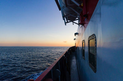 Scenic view of sea against clear sky during sunset