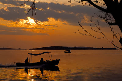 Silhouette of boat during sunset