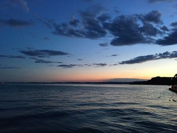 Scenic view of sea against sky at sunset