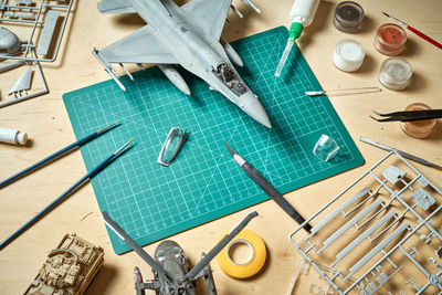 High angle view of toy with paintbrush on table