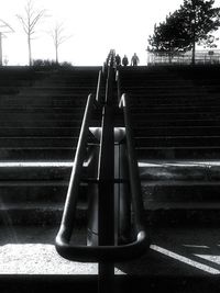 Staircase with railings in background