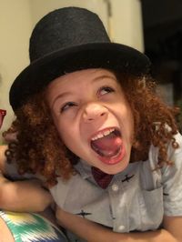 Portrait of happy boy wearing hat