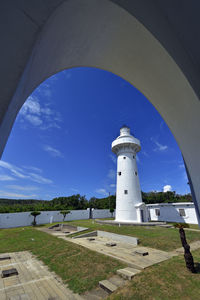 Lighthouse against blue sky