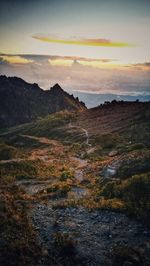 Scenic view of landscape against sky during sunset