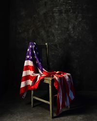 Close-up of flag against black background