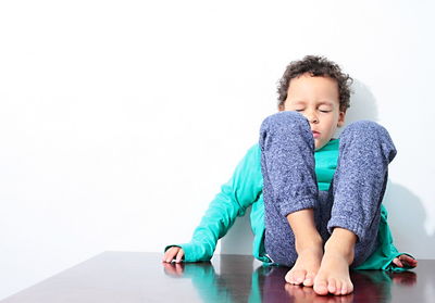 Little boy in poverty also praying and crying for food with no help stock photo