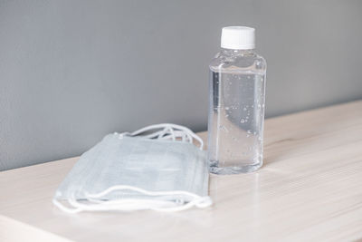 Close-up of water bottle on table