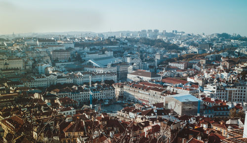 Aerial view of cityscape against sky