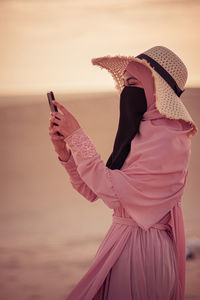 Young woman with umbrella