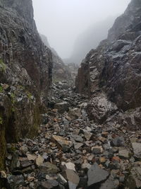 Scenic view of rocky mountains against sky