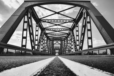 Low angle view of railroad tracks against sky