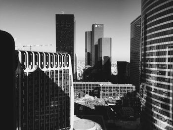 Modern buildings in city against sky