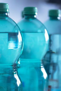 Close-up of blue water bottles
