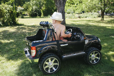 Toddler in ride-in car