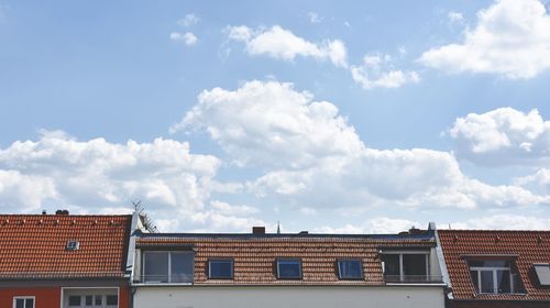 High section of building against cloudy sky