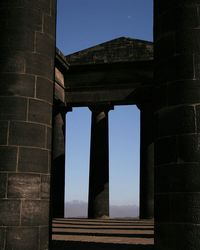 Low angle view of historical building against blue sky