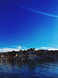 Scenic view of sea against blue sky