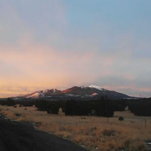 Scenic view of mountains against sky during sunset