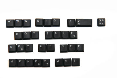 Close-up of computer keyboard against white background