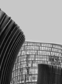 Low angle view of modern building against clear sky