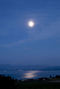 Scenic view of calm lake at night