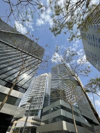 Low angle view of skyscraper against sky