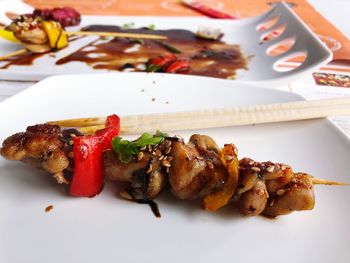 Close-up of meat served in plate on table