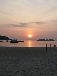 View of calm sea at sunset