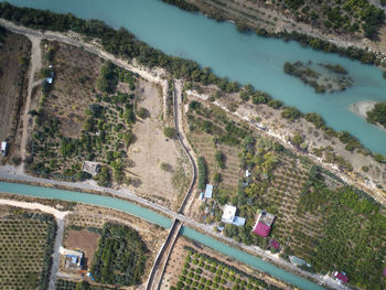 River and irrigation canal at the rural area. top down aerial view.