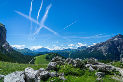 Panoramic shot of mountain range against blue sky