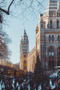 People in front of building in winter