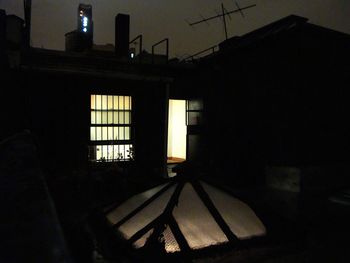 Silhouette of built structure against sky