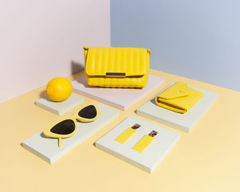 High angle view of yellow and knife on table