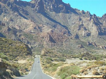 Road leading towards mountains