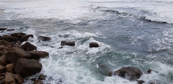 High angle view of rocks on beach