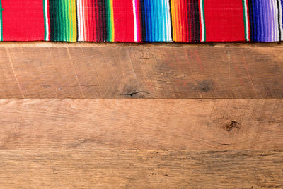 Directly above shot of serape on wooden table