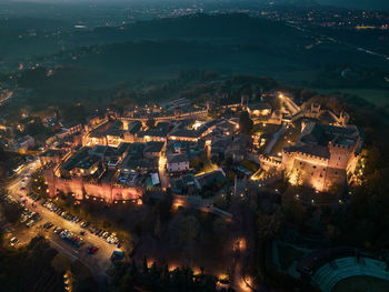 High angle view of illuminated cityscape at night