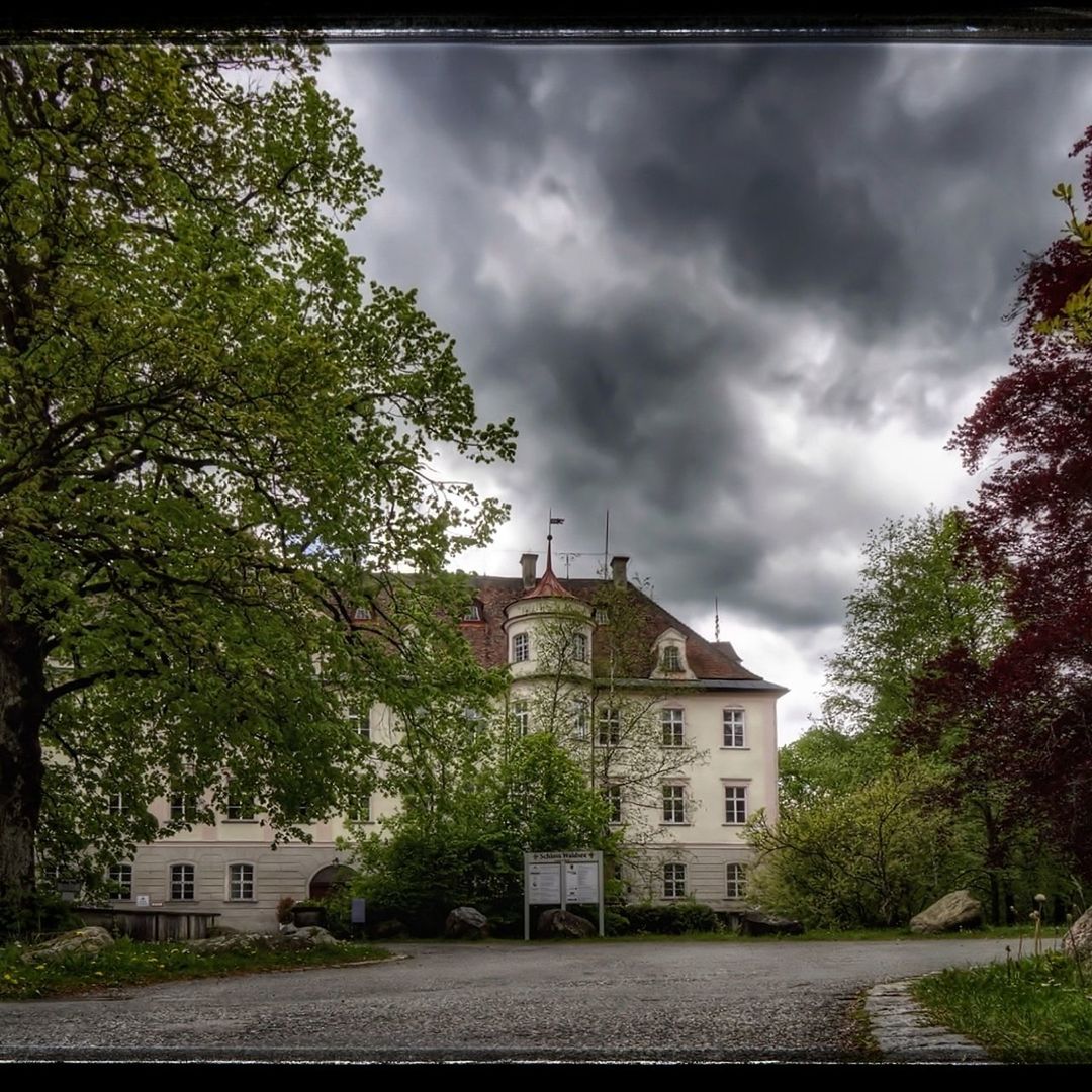 architecture, building exterior, cloud - sky, tree, built structure, building, plant, sky, house, nature, no people, residential district, day, overcast, city, storm, storm cloud, auto post production filter, outdoors, ominous